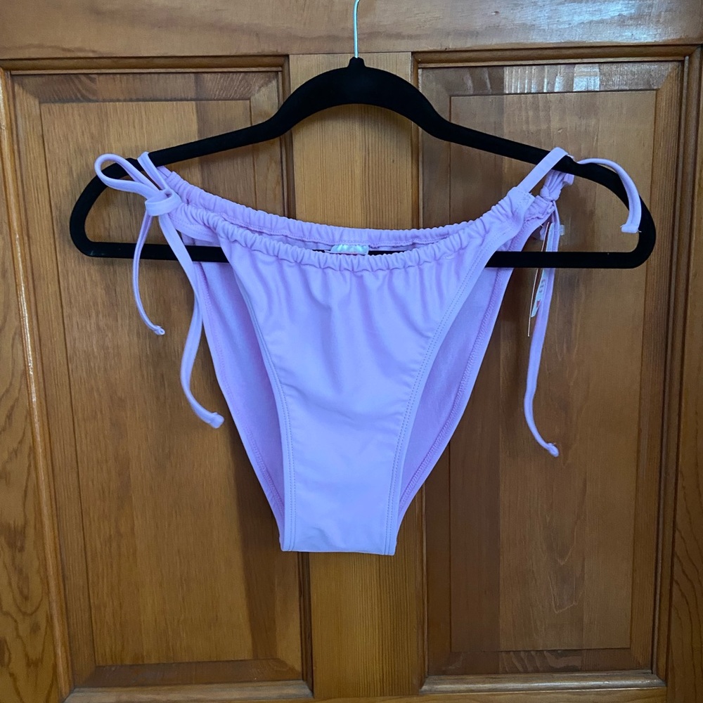 BRAND NEW BATHING SUIT. SOLD AS SET OR INDIVIDUAL